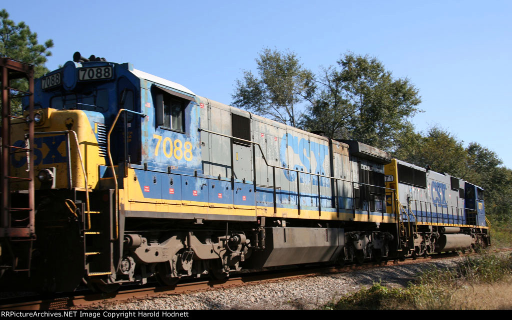 CSX 7088 earns her keep on a ballast train